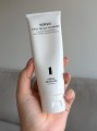verso_daily_facial_cleanser_with_centella_asiatica_aloe_calming_hydrating_product_in_hand.jpg
